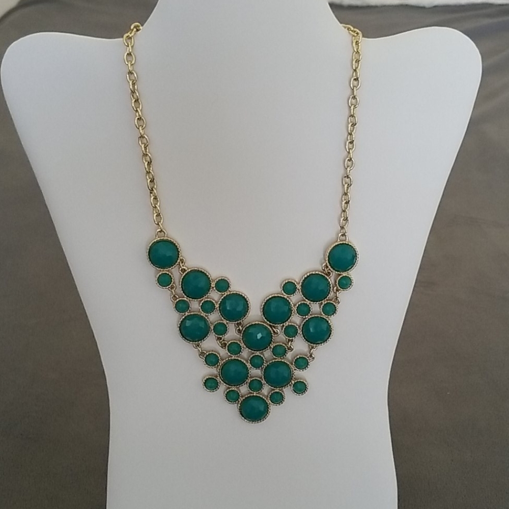 Teal and gold colored statement bib necklace